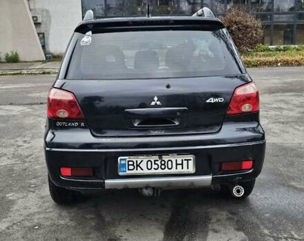 Чорний Міцубісі Аутлендер, об'ємом двигуна 2 л та пробігом 290 тис. км за 4200 $, фото 4 на Automoto.ua