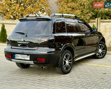 Міцубісі Аутлендер 2007 у Одесі на Automoto.ua Чорний Міцубісі Аутлендер, об'ємом двигуна 2.4 л та пробігом 201 тис. км за 7700 $, фото 7 на Automoto.ua