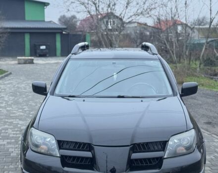 Чорний Міцубісі Аутлендер, об'ємом двигуна 2.4 л та пробігом 202 тис. км за 5800 $, фото 2 на Automoto.ua