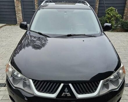 Черный Мицубиси Аутлендер, объемом двигателя 3 л и пробегом 238 тыс. км за 10800 $, фото 2 на Automoto.ua