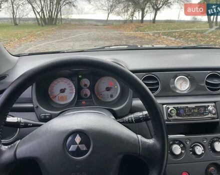 Чорний Міцубісі Аутлендер, об'ємом двигуна 2.4 л та пробігом 213 тис. км за 6850 $, фото 13 на Automoto.ua