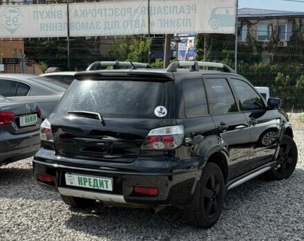 Черный Мицубиси Аутлендер, объемом двигателя 2.4 л и пробегом 258 тыс. км за 6300 $, фото 4 на Automoto.ua