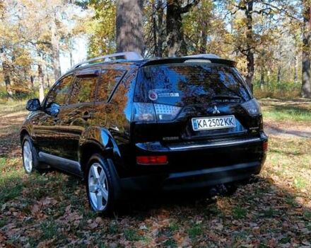 Міцубісі Аутлендер 2007 у Белой Церкве на Automoto.ua Чорний Міцубісі Аутлендер, об'ємом двигуна 3 л та пробігом 230 тис. км за 8800 $, фото 1 на Automoto.ua