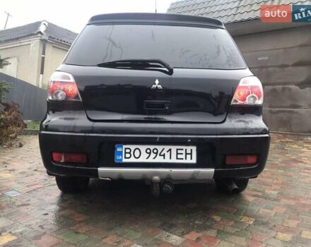Черный Мицубиси Аутлендер, объемом двигателя 2 л и пробегом 284 тыс. км за 4500 $, фото 7 на Automoto.ua