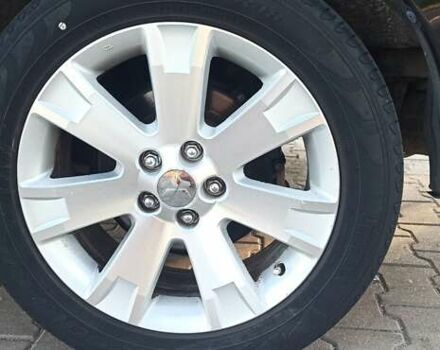 Черный Мицубиси Аутлендер, объемом двигателя 1.97 л и пробегом 244 тыс. км за 9000 $, фото 18 на Automoto.ua