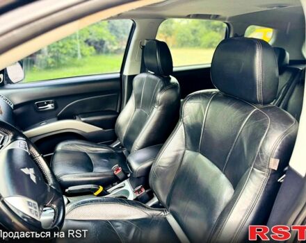 Черный Мицубиси Аутлендер, объемом двигателя 3 л и пробегом 200 тыс. км за 9799 $, фото 8 на Automoto.ua