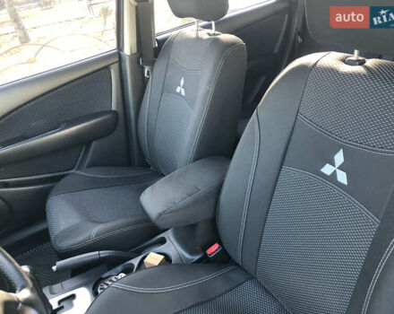Черный Мицубиси Аутлендер, объемом двигателя 2.4 л и пробегом 260 тыс. км за 7200 $, фото 17 на Automoto.ua