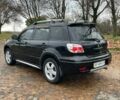 Черный Мицубиси Аутлендер, объемом двигателя 2.4 л и пробегом 213 тыс. км за 6850 $, фото 8 на Automoto.ua