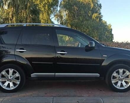 Черный Мицубиси Аутлендер, объемом двигателя 1.97 л и пробегом 244 тыс. км за 9000 $, фото 5 на Automoto.ua