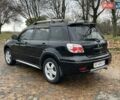 Чорний Міцубісі Аутлендер, об'ємом двигуна 2.4 л та пробігом 213 тис. км за 6850 $, фото 8 на Automoto.ua