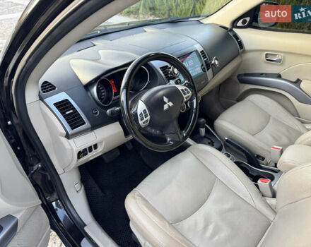 Черный Мицубиси Аутлендер, объемом двигателя 3 л и пробегом 205 тыс. км за 11300 $, фото 11 на Automoto.ua