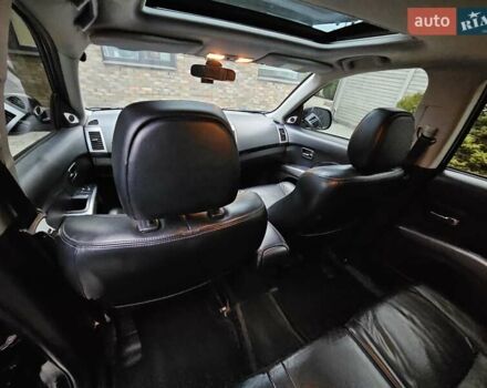 Черный Мицубиси Аутлендер, объемом двигателя 3 л и пробегом 238 тыс. км за 10800 $, фото 32 на Automoto.ua