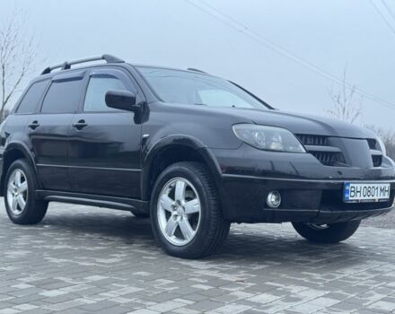 Чорний Міцубісі Аутлендер, об'ємом двигуна 2.4 л та пробігом 202 тис. км за 5800 $, фото 3 на Automoto.ua