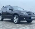 Чорний Міцубісі Аутлендер, об'ємом двигуна 2.4 л та пробігом 202 тис. км за 5800 $, фото 3 на Automoto.ua