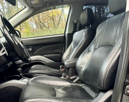 Черный Мицубиси Аутлендер, объемом двигателя 2.4 л и пробегом 230 тыс. км за 8500 $, фото 13 на Automoto.ua