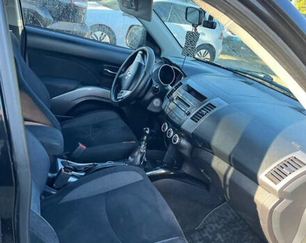 Чорний Міцубісі Аутлендер, об'ємом двигуна 2 л та пробігом 330 тис. км за 7500 $, фото 4 на Automoto.ua