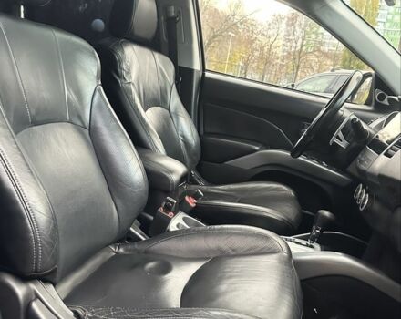 Черный Мицубиси Аутлендер, объемом двигателя 2.4 л и пробегом 230 тыс. км за 8500 $, фото 16 на Automoto.ua