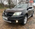 Чорний Міцубісі Аутлендер, об'ємом двигуна 2.4 л та пробігом 213 тис. км за 6850 $, фото 1 на Automoto.ua