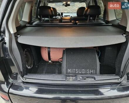 Черный Мицубиси Аутлендер, объемом двигателя 3 л и пробегом 238 тыс. км за 10800 $, фото 24 на Automoto.ua