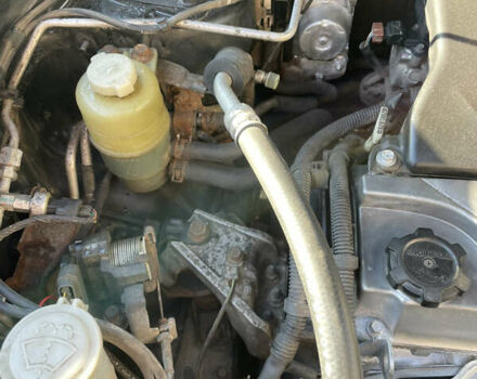 Черный Мицубиси Аутлендер, объемом двигателя 2.38 л и пробегом 118 тыс. км за 6850 $, фото 11 на Automoto.ua