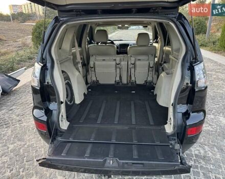 Черный Мицубиси Аутлендер, объемом двигателя 3 л и пробегом 205 тыс. км за 11300 $, фото 27 на Automoto.ua