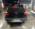 Черный Мицубиси Аутлендер, объемом двигателя 2 л и пробегом 295 тыс. км за 5300 $, фото 3 на Automoto.ua