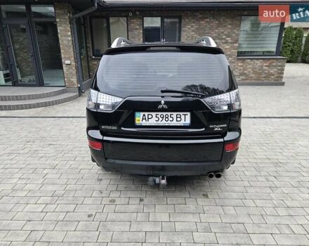 Черный Мицубиси Аутлендер, объемом двигателя 3 л и пробегом 238 тыс. км за 10800 $, фото 7 на Automoto.ua