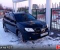 Чорний Міцубісі Аутлендер, об'ємом двигуна 2.4 л та пробігом 226 тис. км за 6500 $, фото 1 на Automoto.ua