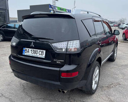 Черный Мицубиси Аутлендер, объемом двигателя 3 л и пробегом 202 тыс. км за 9999 $, фото 6 на Automoto.ua