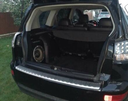 Черный Мицубиси Аутлендер, объемом двигателя 3 л и пробегом 260 тыс. км за 9000 $, фото 3 на Automoto.ua