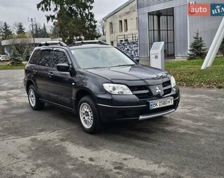 Чорний Міцубісі Аутлендер, об'ємом двигуна 2 л та пробігом 290 тис. км за 4200 $, фото 15 на Automoto.ua