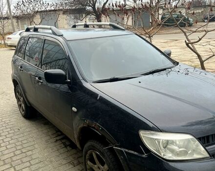 Чорний Міцубісі Аутлендер, об'ємом двигуна 2.4 л та пробігом 267 тис. км за 6000 $, фото 1 на Automoto.ua
