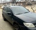 Чорний Міцубісі Аутлендер, об'ємом двигуна 2.4 л та пробігом 267 тис. км за 6000 $, фото 1 на Automoto.ua