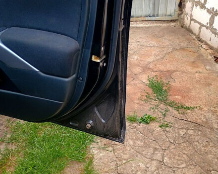 Черный Мицубиси Аутлендер, объемом двигателя 2 л и пробегом 218 тыс. км за 10500 $, фото 9 на Automoto.ua