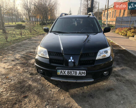 Черный Мицубиси Аутлендер, объемом двигателя 2.4 л и пробегом 260 тыс. км за 7200 $, фото 9 на Automoto.ua