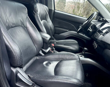 Чорний Міцубісі Аутлендер, об'ємом двигуна 2.4 л та пробігом 230 тис. км за 8300 $, фото 22 на Automoto.ua