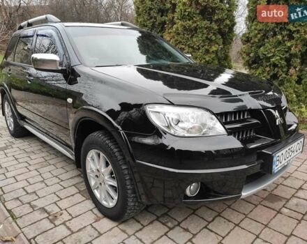 Черный Мицубиси Аутлендер, объемом двигателя 2 л и пробегом 180 тыс. км за 6000 $, фото 6 на Automoto.ua