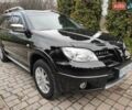 Черный Мицубиси Аутлендер, объемом двигателя 2 л и пробегом 180 тыс. км за 6000 $, фото 6 на Automoto.ua
