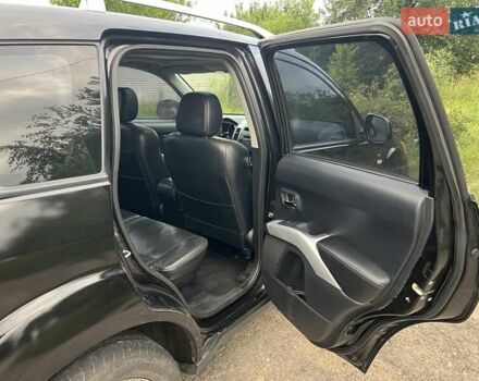 Чорний Міцубісі Аутлендер, об'ємом двигуна 3 л та пробігом 260 тис. км за 10700 $, фото 6 на Automoto.ua