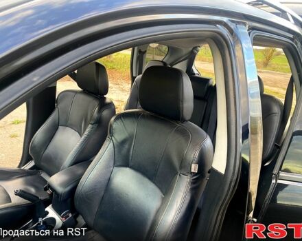 Черный Мицубиси Аутлендер, объемом двигателя 2 л и пробегом 207 тыс. км за 8100 $, фото 12 на Automoto.ua