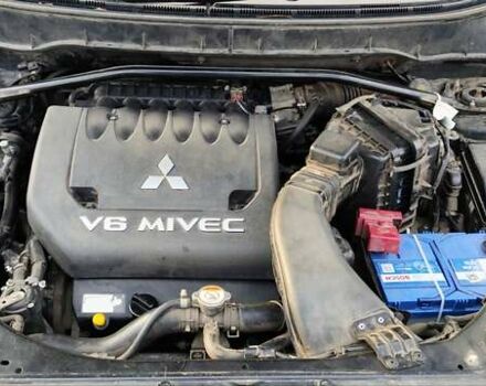 Черный Мицубиси Аутлендер, объемом двигателя 3 л и пробегом 190 тыс. км за 10000 $, фото 17 на Automoto.ua