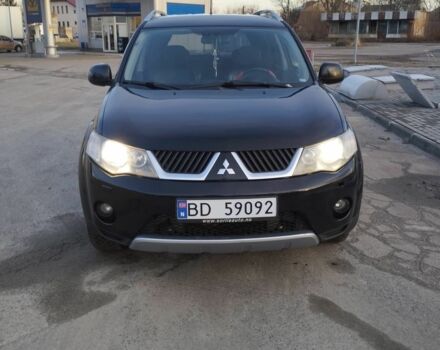 Черный Мицубиси Аутлендер, объемом двигателя 2 л и пробегом 290 тыс. км за 4900 $, фото 1 на Automoto.ua
