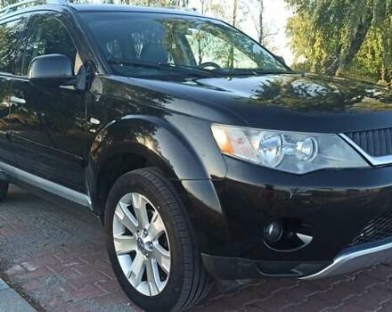 Черный Мицубиси Аутлендер, объемом двигателя 1.97 л и пробегом 244 тыс. км за 9000 $, фото 6 на Automoto.ua