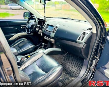 Черный Мицубиси Аутлендер, объемом двигателя 3 л и пробегом 200 тыс. км за 9799 $, фото 11 на Automoto.ua