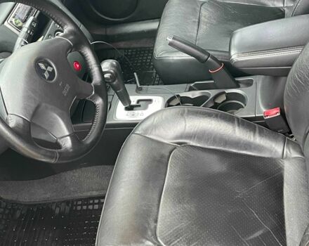 Черный Мицубиси Аутлендер, объемом двигателя 2.4 л и пробегом 213 тыс. км за 6850 $, фото 14 на Automoto.ua