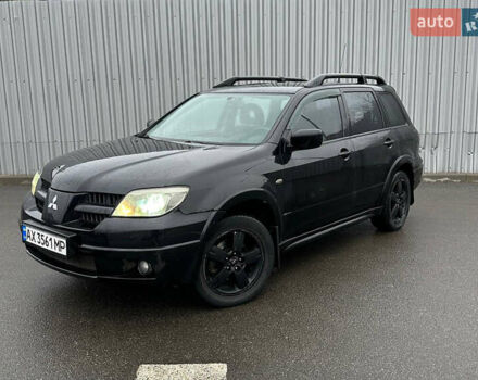 Чорний Міцубісі Аутлендер, об'ємом двигуна 2.38 л та пробігом 175 тис. км за 6000 $, фото 1 на Automoto.ua