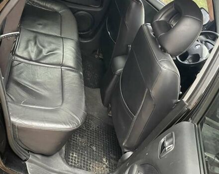 Чорний Міцубісі Аутлендер, об'ємом двигуна 2.4 л та пробігом 213 тис. км за 6850 $, фото 21 на Automoto.ua