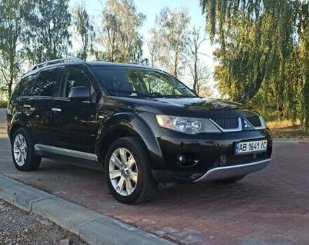 Черный Мицубиси Аутлендер, объемом двигателя 1.97 л и пробегом 244 тыс. км за 9000 $, фото 1 на Automoto.ua