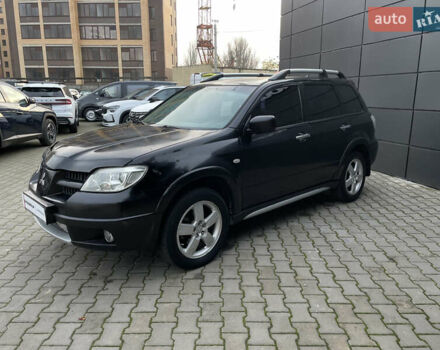Черный Мицубиси Аутлендер, объемом двигателя 2.4 л и пробегом 248 тыс. км за 7300 $, фото 5 на Automoto.ua
