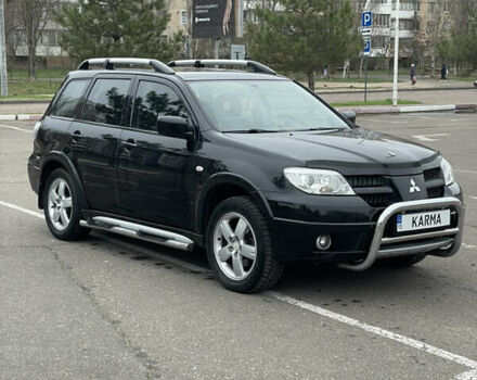 Чорний Міцубісі Аутлендер, об'ємом двигуна 2.38 л та пробігом 198 тис. км за 7100 $, фото 1 на Automoto.ua